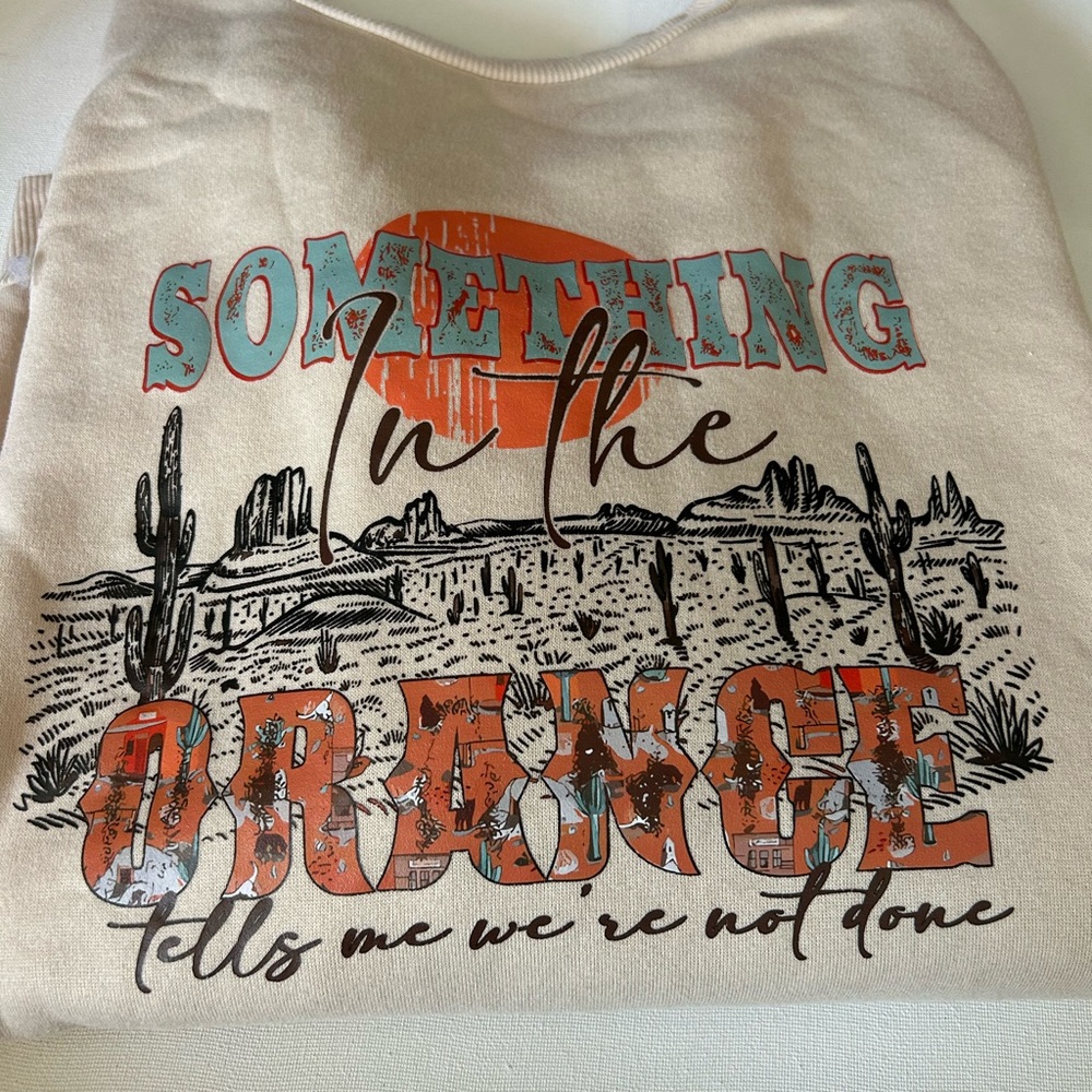 Graphic Beige Sweatshirt with Orange and Teal Accents